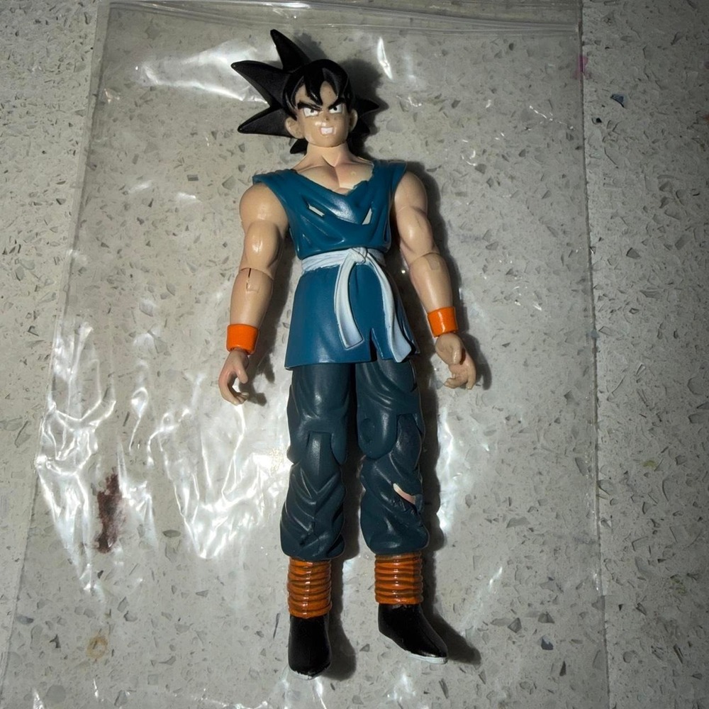 Dragon Ball Z JAKKS action figure in blue and orange